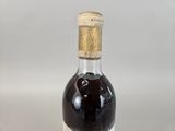 a bottle of wine that is sitting on a table