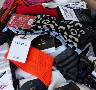 many pairs of socks and socks that are in a box