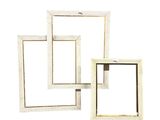 three white wooden square shelves with one open and the other closed