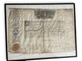 the declaration of the united states of america is displayed in a black frame