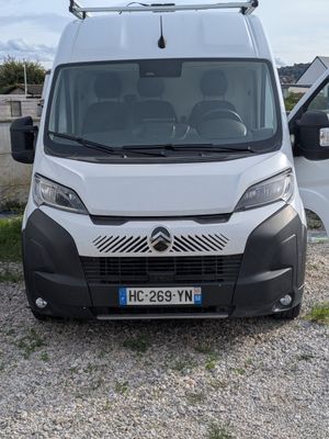 the white van is parked next to the white van