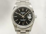 rolex day date watch with black dial and black roman numerals