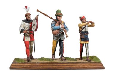 three figurines of men dressed in medieval clothing and holding weapons
