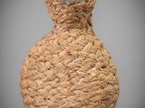 an image of a woven vase with a glass lid