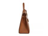 a brown leather handbag on a white background