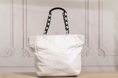 chanel white canvas tote bag with black chain handles