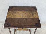a small table with a patchwork design on it