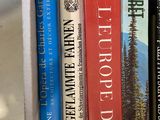 many books that are sitting in a box together