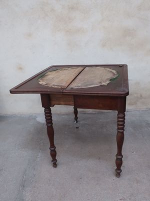 a small table with a book on top of it