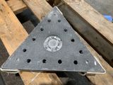 a triangular piece of metal that has been placed on a pallet