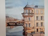 a picture of a painting of a building by the water