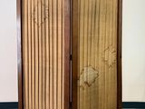 une image représentant un paravent surmonté d'un panneau en bois