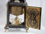 a clock that is sitting inside of a glass case