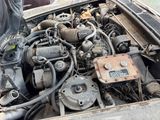 an old car engine with its hood open and the hood down