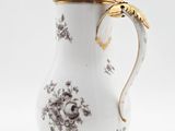 an image of a white and gold coffee pot
