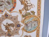 a picture of a scarf with a picture of knights on it