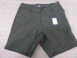 the shorts are green and have a tag on the side of them