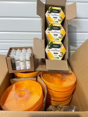 a cardboard box filled with many different types of food
