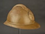 a helmet on a stand on a gray background