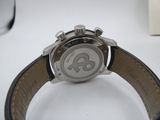 a close up of a wrist watch on a table