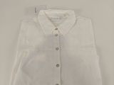 the shirt is white and has a button down collar