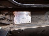 a close up of a car ' s dashboard with a ticket attached to it