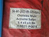 a sign on the side of a red container