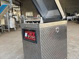 l'image d'une machine installée dans un entrepôt