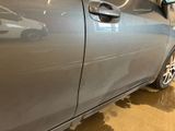 a car that is parked inside of a garage