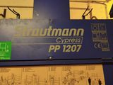 a picture of a blue machine with instructions on it