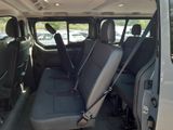 a seat in the back of a van that has two rows of seats