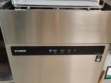 a dishwasher that is sitting in a kitchen