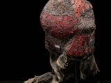 an image of a sculpture of a human head on a black surface