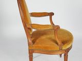 an image of a chair with a yellow velvet upholstered seat
