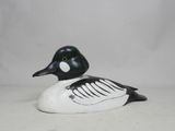 une image représentant un canard noir et blanc sur fond blanc