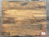 a piece of wood that is sitting on the ground