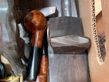 a box full of different types of knives and other items