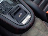 a close up of a remote control in a car