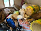 a pile of items that are sitting on the floor