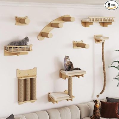a cat sitting on a cat tree in a living room