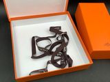 an orange box with a pair of glasses in it on a table