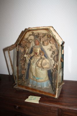 a picture of a picture of a woman in a frame on a table