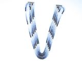 a close up of a necklace on a white background
