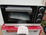 a toaster oven sitting on top of a box