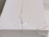 a close up of a white box on a table