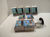 a lot of books and headphones on the table