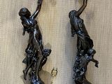 pair of antique bronze wall sconces with a lady and child