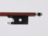 a close up of a violin bow on a white background