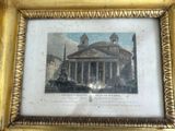 a picture of a picture of a building in a gold frame