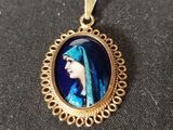 an image of a picture of a woman wearing a blue veil